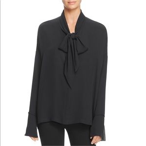 Theory black silk scarf tie blouse with bell sleeves.